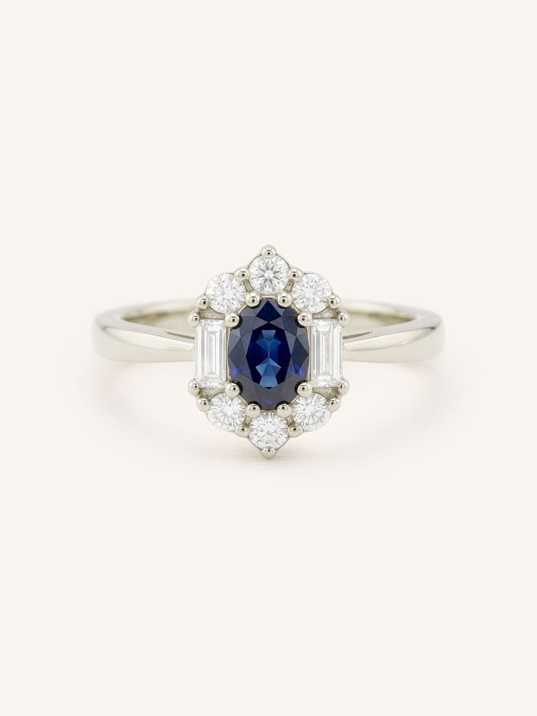 White Gold Wyona Oval Blue Sapphire Halo Style Ring front view on white background