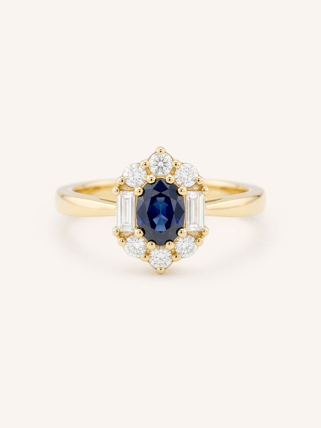 Yellow Gold Wyona Oval Blue Sapphire Halo Style Ring front view on white background