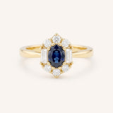Yellow Gold Wyona Oval Blue Sapphire Halo Style Ring front view on white background