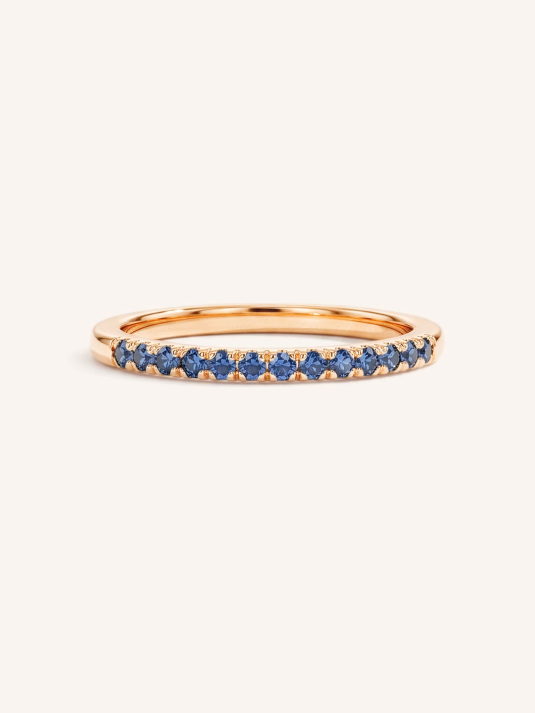 Rose Gold Blue Sapphire Birthstone Stackable Ring front view on white background