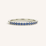White Gold Blue Sapphire Birthstone Stackable Ring front view on white background