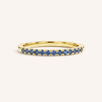 Yellow Gold Blue Sapphire Birthstone Stackable Ring front view on white background