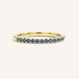 Yellow Gold Blue Sapphire Birthstone Stackable Ring front view on white background