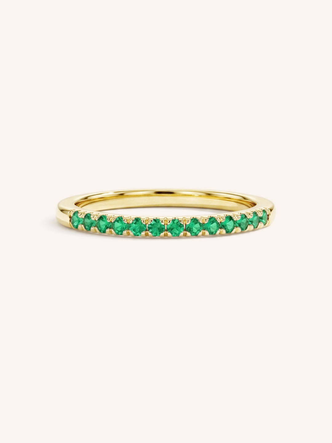 Yellow Gold Emerald Birthstone Stackable Ring front view on white background