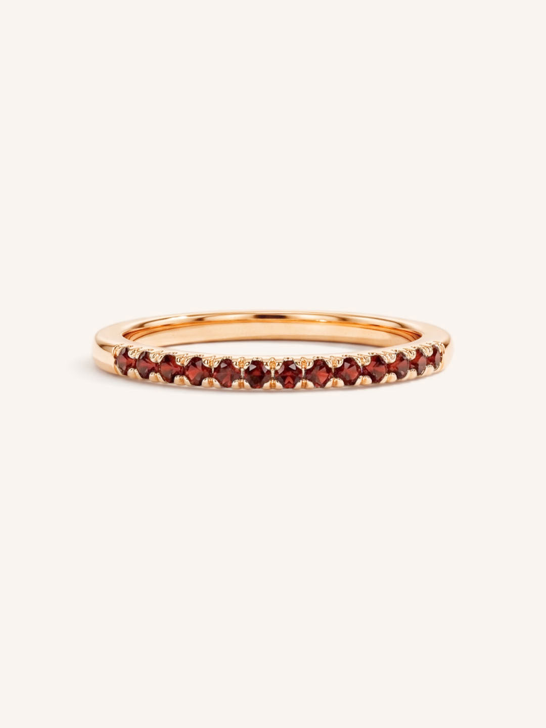 Rose Gold Red Garnet Birthstone Stackable Ring front view on white background