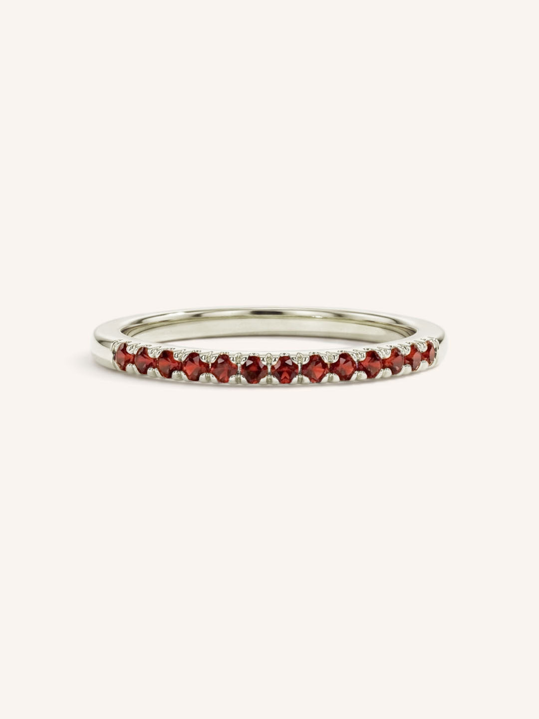 White Gold Red Garnet Birthstone Stackable Ring front view on white background