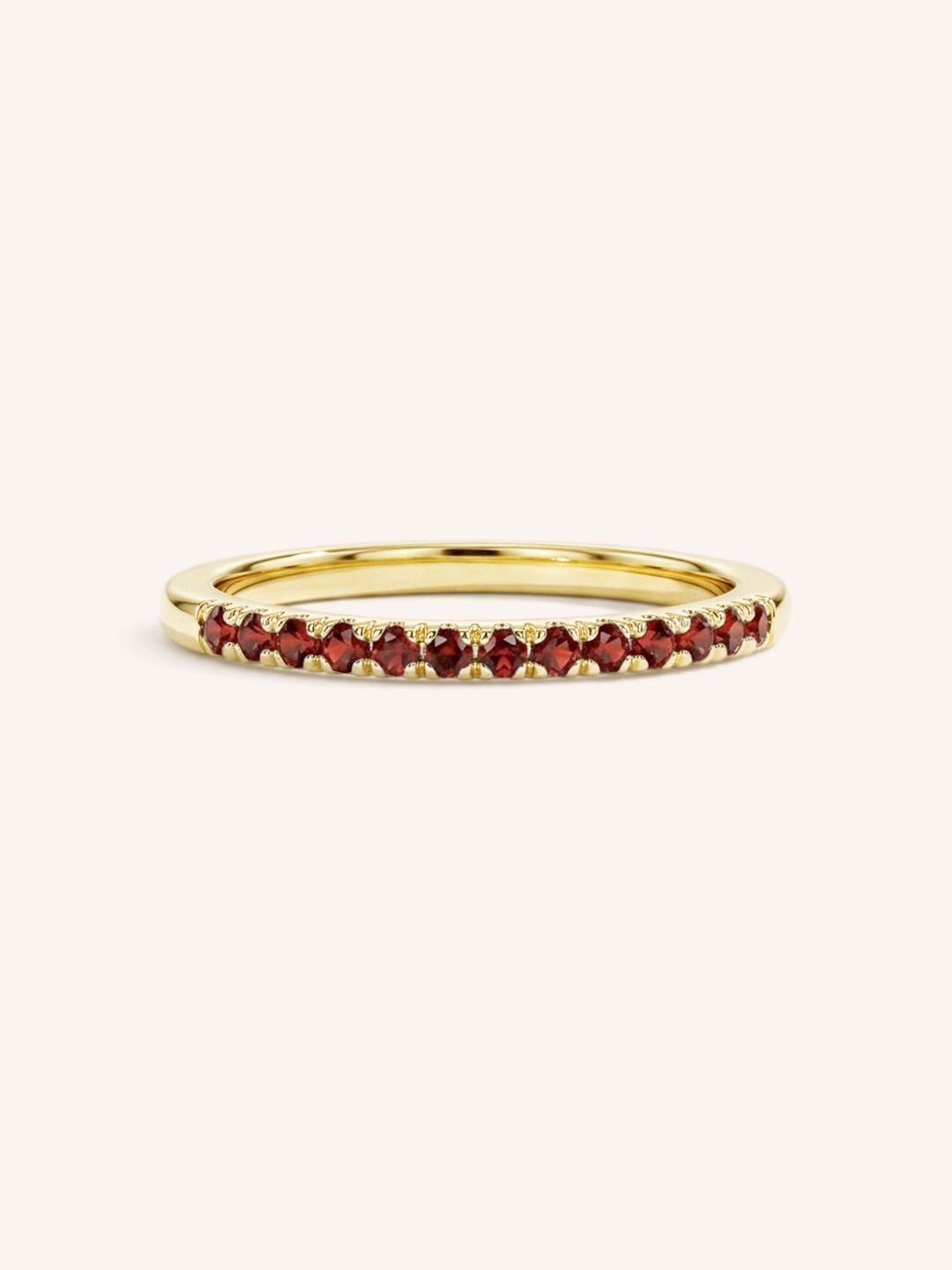Yellow Gold Red Garnet Birthstone Stackable Ring front view on white background