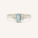 White Gold Abigail Blue Topaz Diamond Accented Ring front view on white background