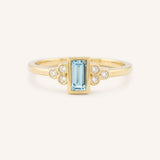 Yellow Gold Abigail Blue Topaz Diamond Accented Ring front view on white background