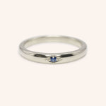 White gold Beacon blue sapphire stackable ring front view on white background