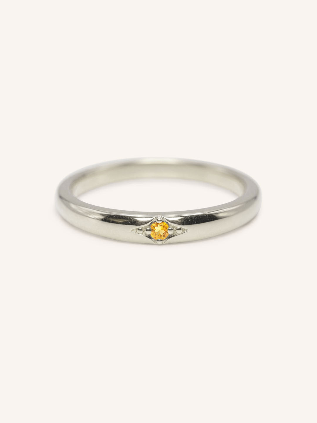 White gold Beacon citrine stackable ring front view on white background