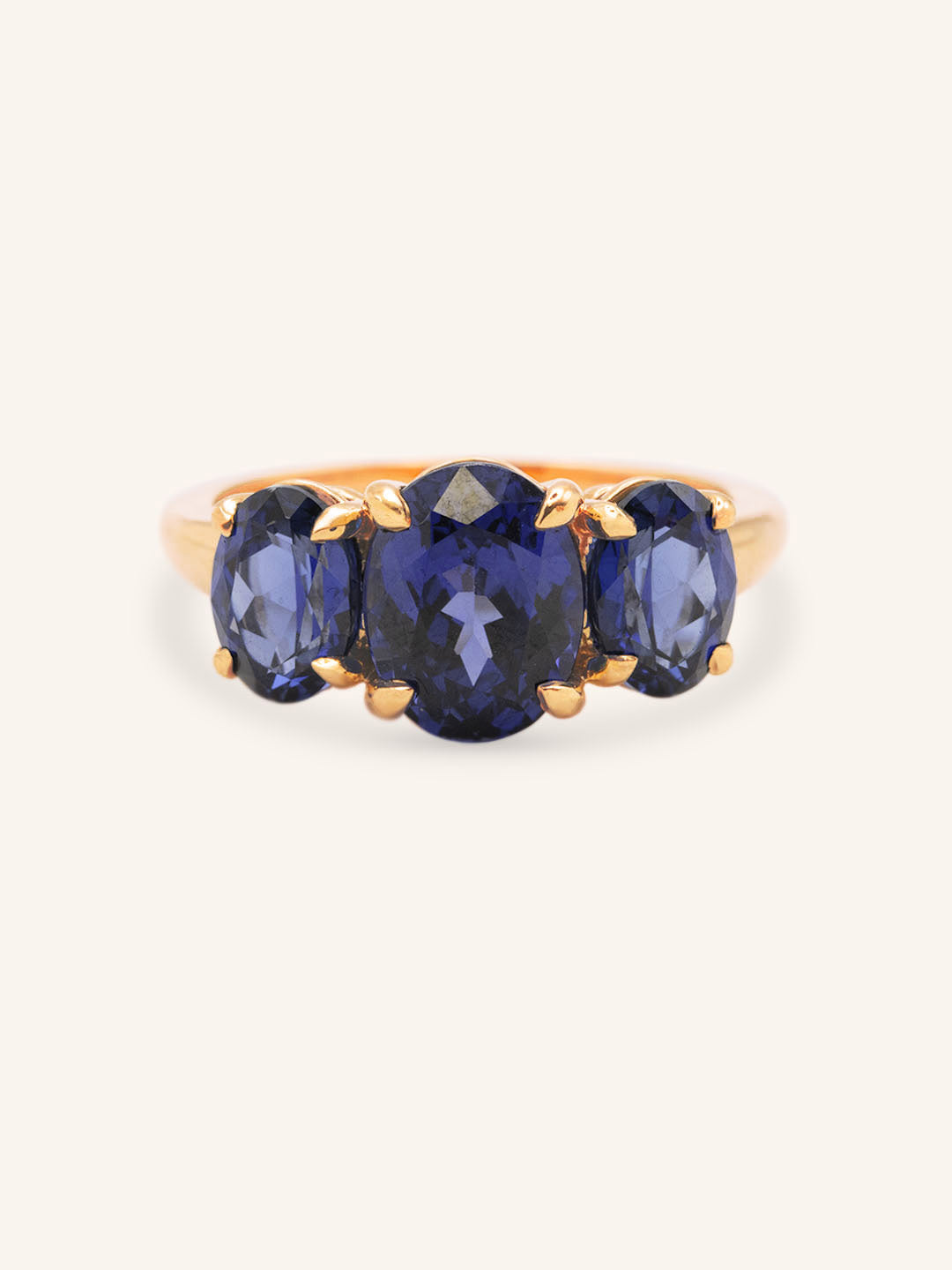 Trielle Three Stone Oval Cut Blue Sapphire Ring