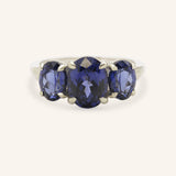 Trielle Three Stone Oval Cut Blue Sapphire Ring