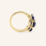 Trielle Three Stone Oval Cut Blue Sapphire Ring