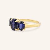 Trielle Three Stone Oval Cut Blue Sapphire Ring