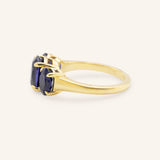 Trielle Three Stone Oval Cut Blue Sapphire Ring