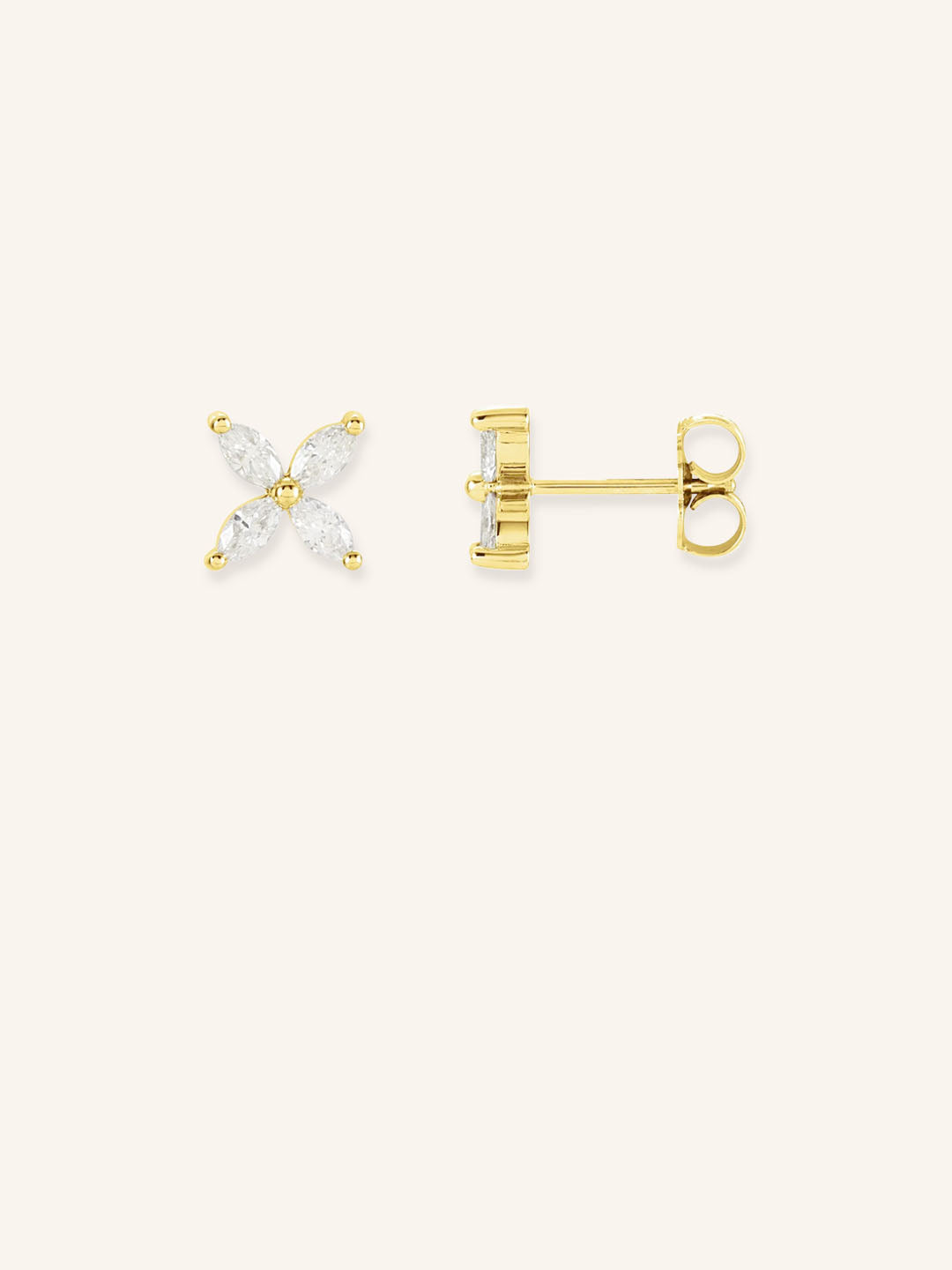A pair of floral-inspired marquise diamond stud earrings in gold mounting, displayed against a white background.