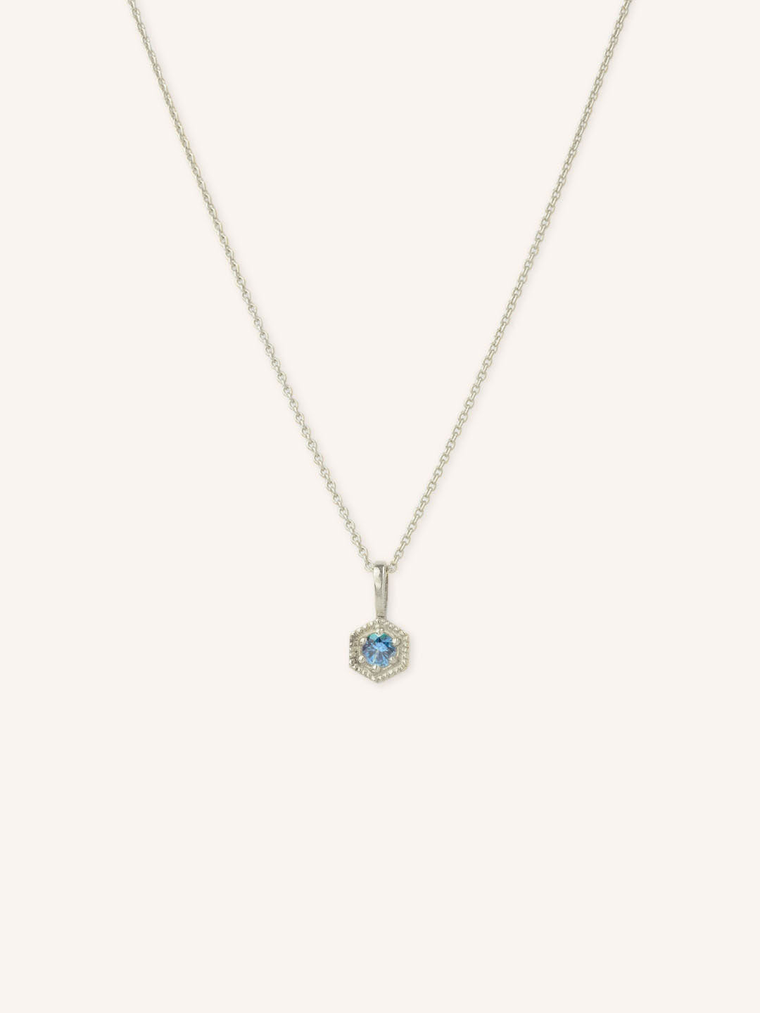 White gold Marigold Montana sapphire pendant necklace on white background