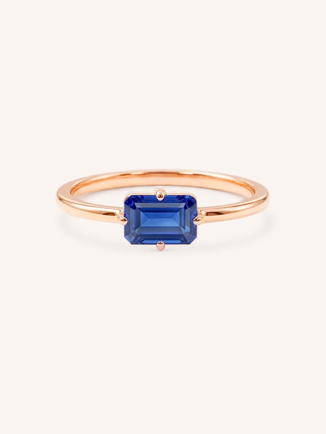 Rose Gold Ladys Mantle Blue Sapphire Ring on white background