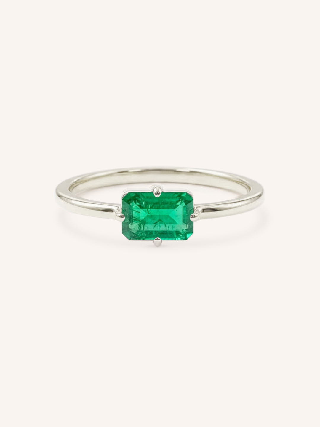 White Gold Ladys Mantle Emerald Ring on white background