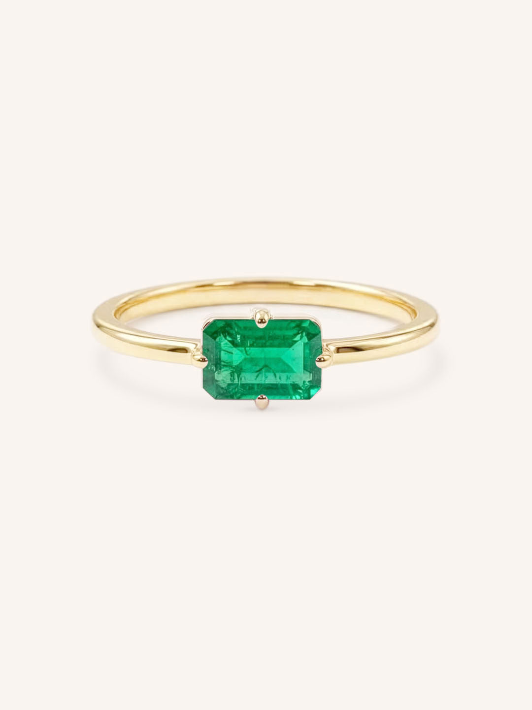 Yellow Gold Ladys Mantle Emerald Ring on white background