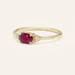 Yellow gold Celestia ruby diamond ring side view on white background