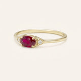 Yellow gold Celestia ruby diamond ring side view on white background