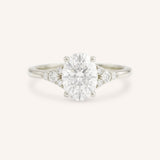White Shade Oval Diamond Cluster Engagement Ring