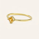 Yellow gold Farewell to Spring citrine ring side view on white background