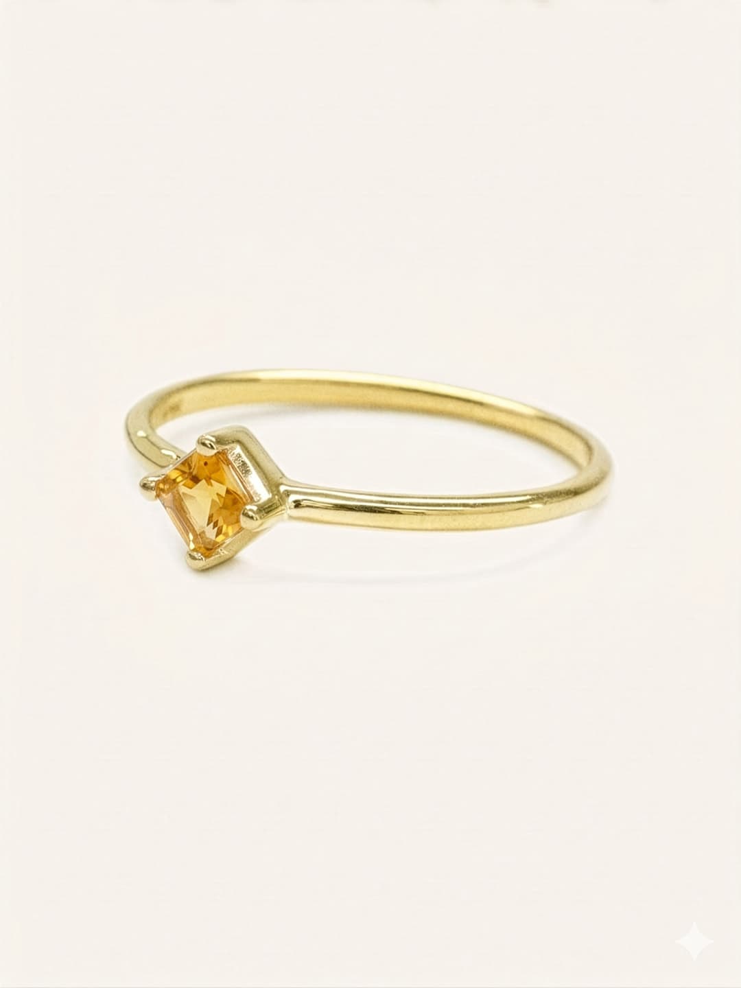 Yellow gold Farewell to Spring citrine ring side view on white background