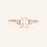 Blushing Bride Moissanite Pear Three Stone Engagement Ring