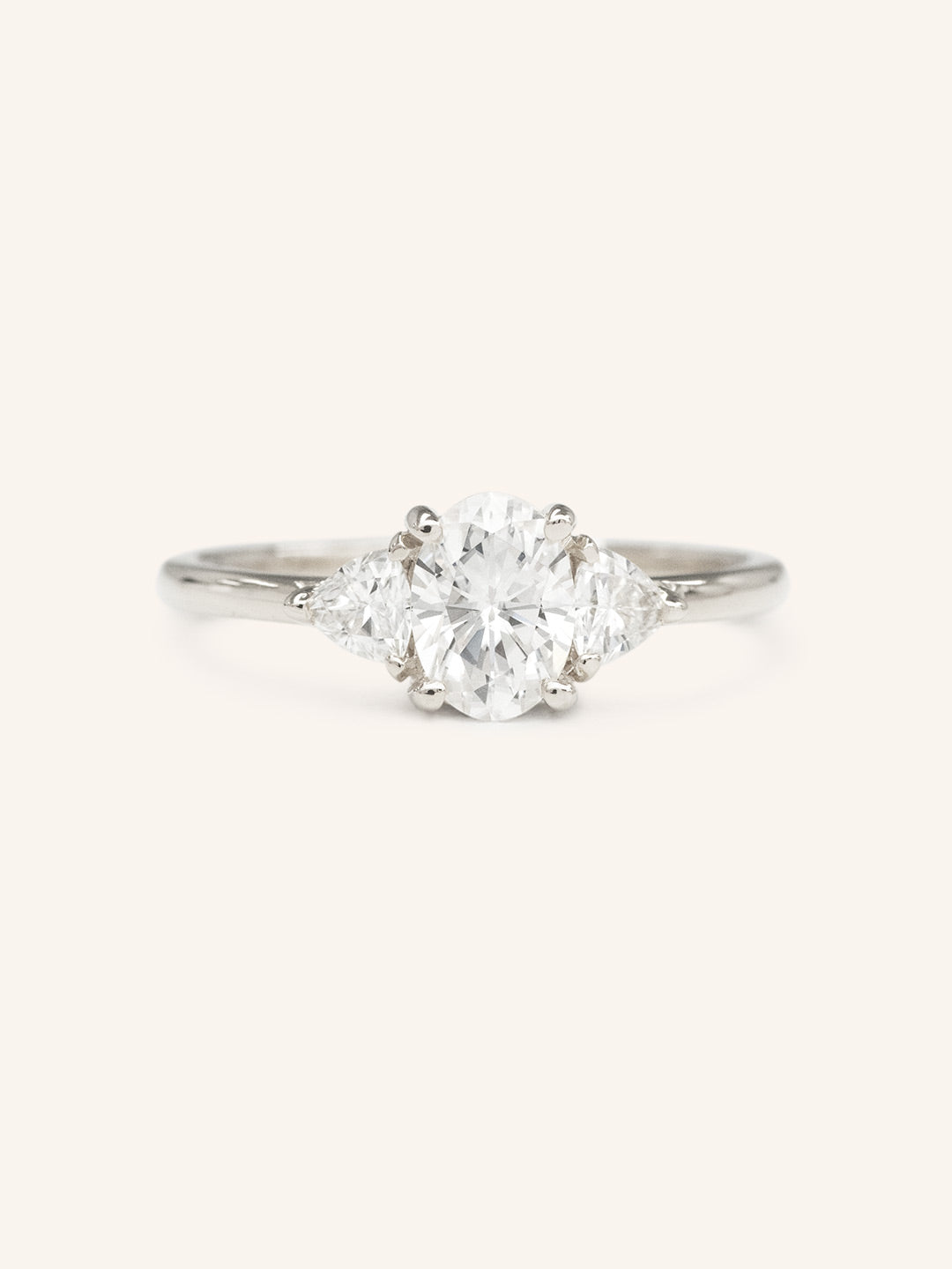 Summer Triangle Oval Three Stone Engagement Ring