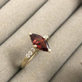 Hidden Halo Marquise Garnet Engagement Ring with Diamond Accents