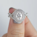 Akin to Embrace Oval Moissanite and Diamond Engagement Ring