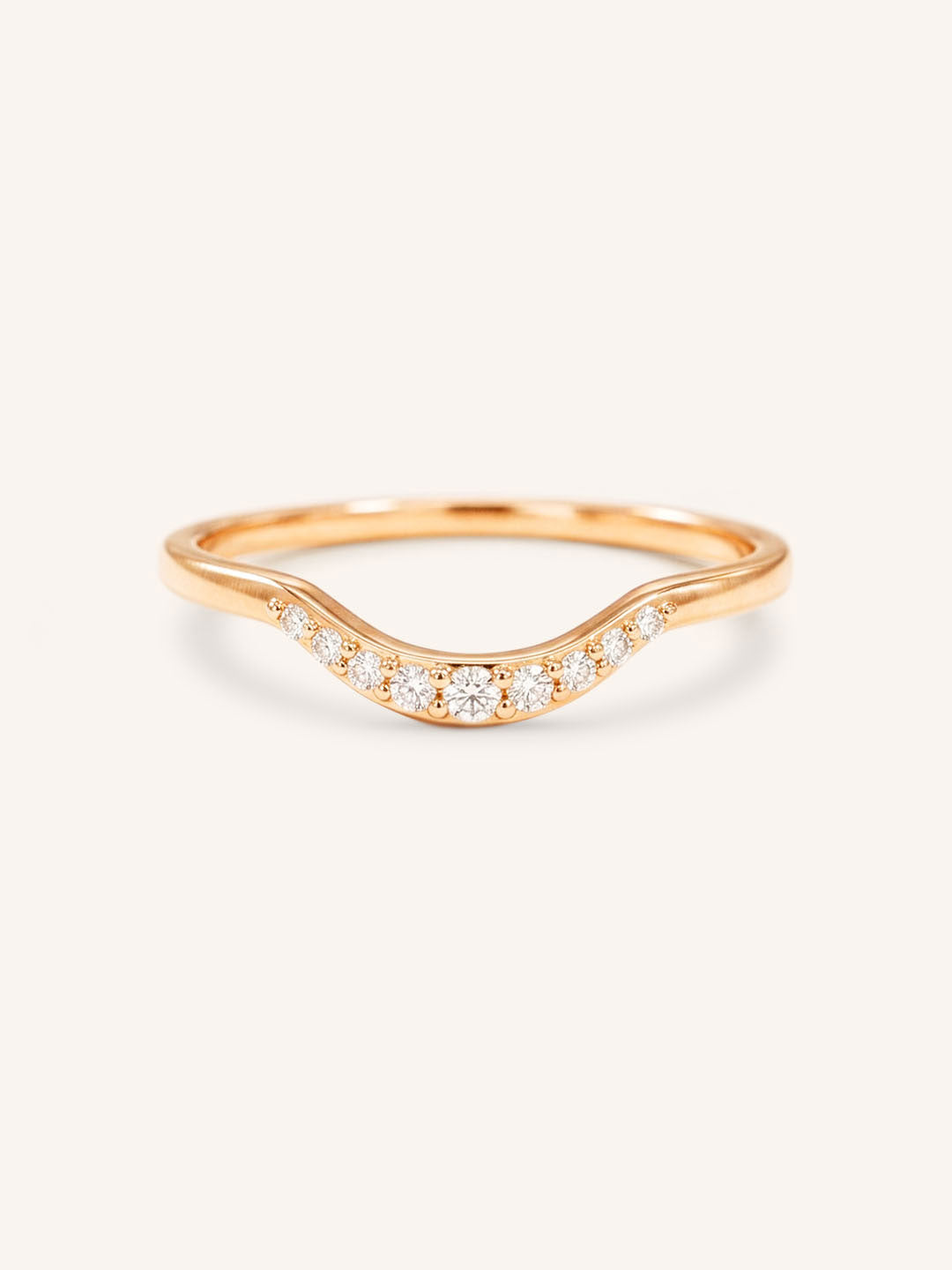 Rose gold Cassidy curved diamond wedding band front view on white background