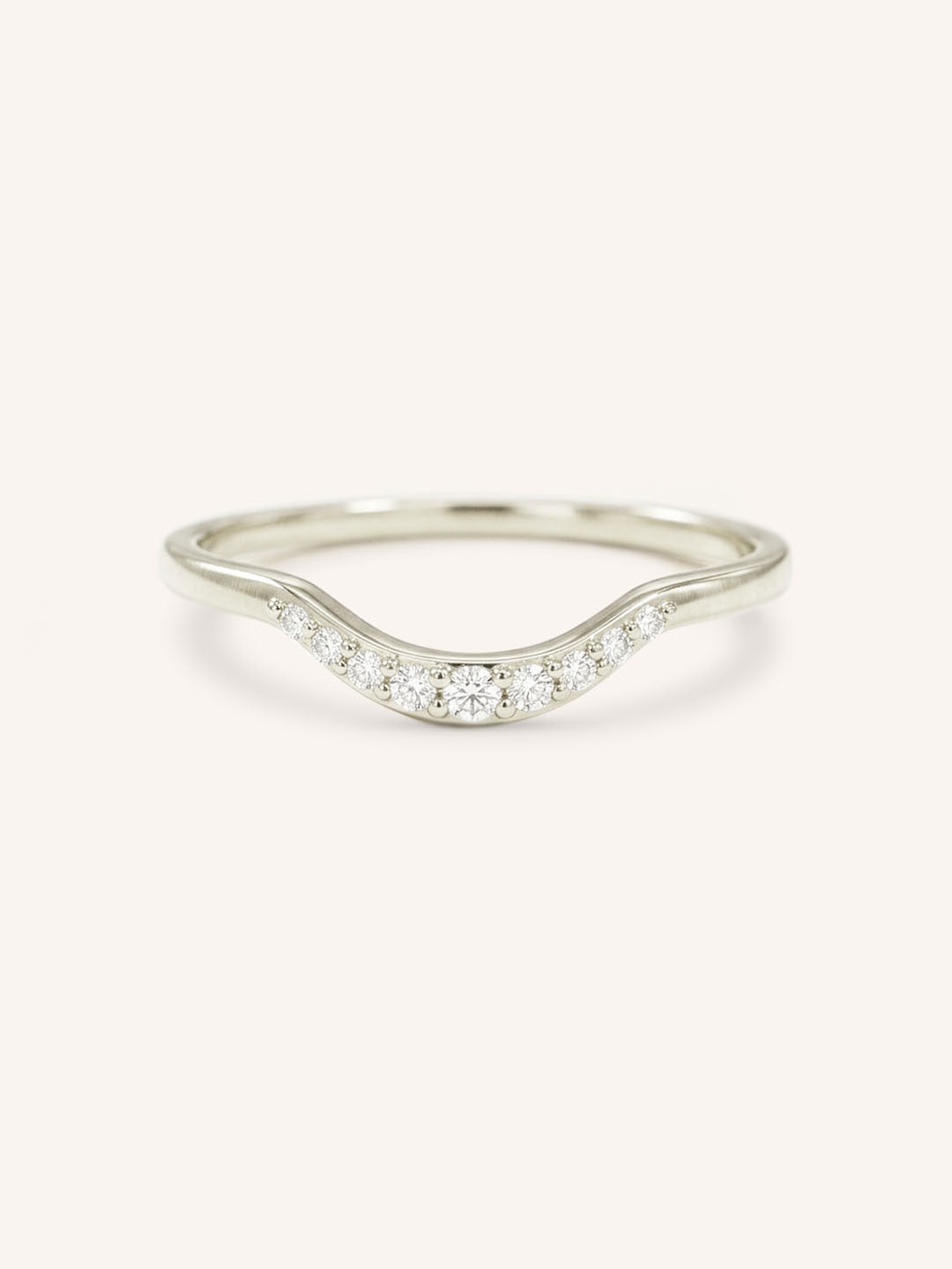 White gold Cassidy curved diamond wedding band front view on white background