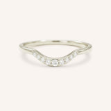 White gold Cassidy curved diamond wedding band front view on white background