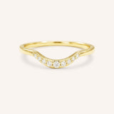 Yellow gold Cassidy curved diamond wedding band front view on white background