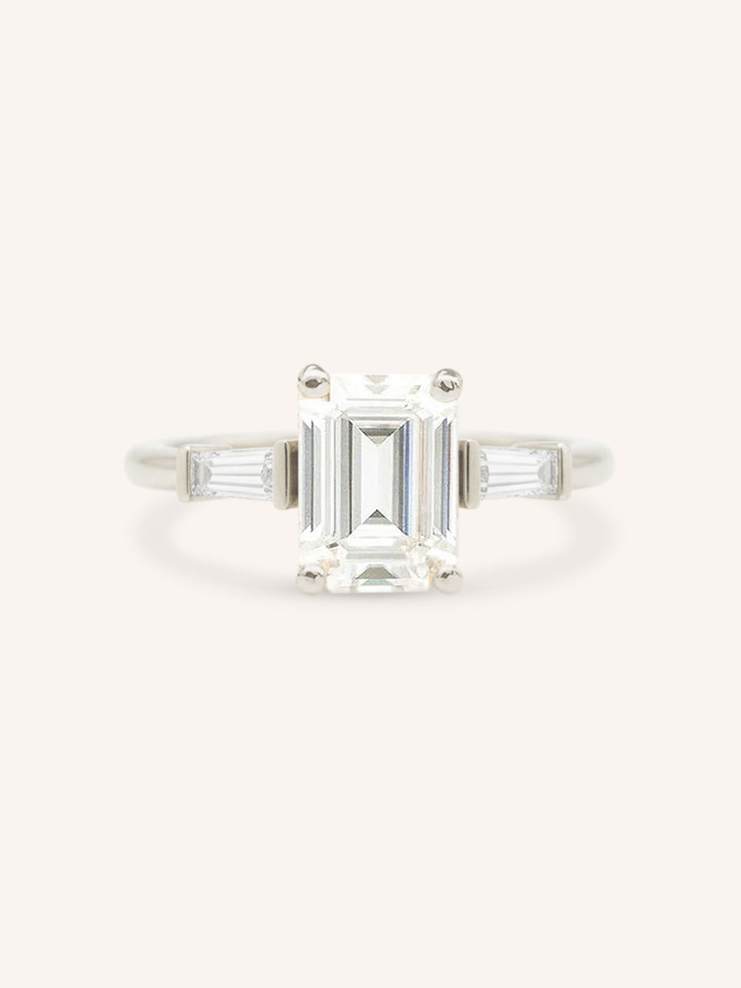 Stately Manor Emerald Cut Moissanite Tapered Baguette Three Stone Engagement Ring