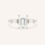 Stately Manor Emerald Cut Moissanite Tapered Baguette Three Stone Engagement Ring