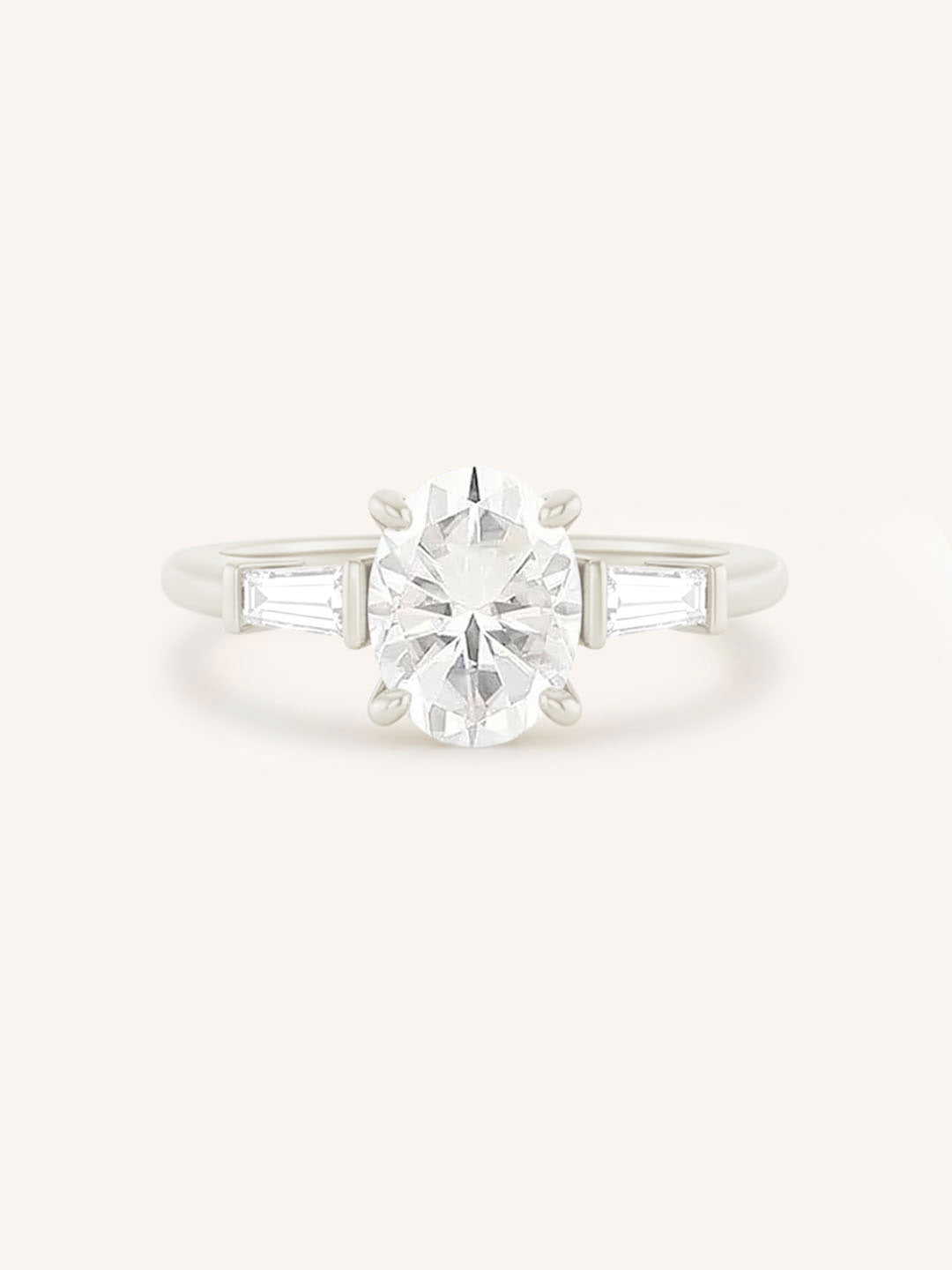 Stately Manor Oval Moissanite Tapered Baguette Three Stone Engagement Ring