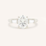 Stately Manor Oval Moissanite Tapered Baguette Three Stone Engagement Ring