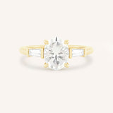 Stately Manor Oval Moissanite Tapered Baguette Three Stone Engagement Ring