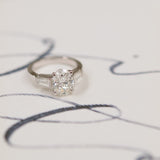 Stately Manor Oval Moissanite Tapered Baguette Three Stone Engagement Ring