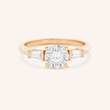 Stately Manor Round Moissanite Tapered Baguette Three Stone Engagement Ring