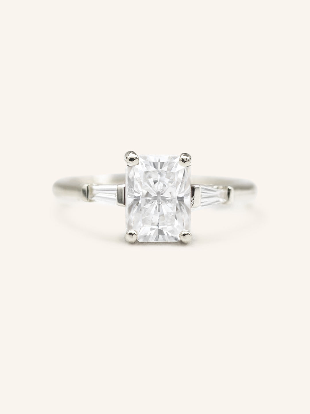 Stately Manor Emerald Cut Moissanite Tapered Baguettes Three Stone