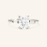 Stately Manor Oval Moissanite Tapered Baguette Three Stone Engagement Ring