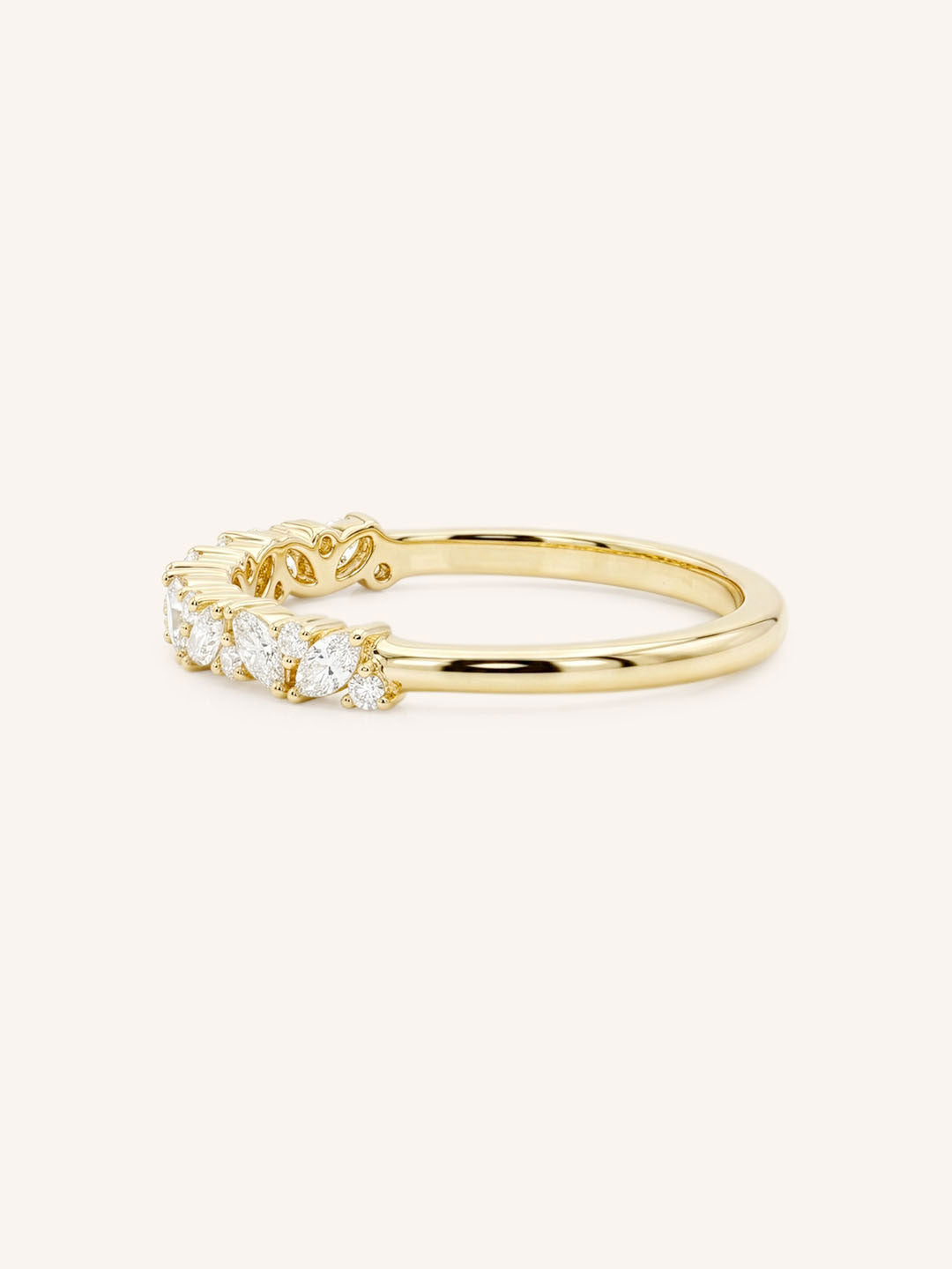 Yellow gold Annalise marquise diamond cluster wedding band side view on white background