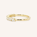 Yellow gold Annalise marquise diamond cluster wedding band side view on white background