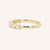 Yellow gold Annalise marquise diamond cluster wedding band side view on white background
